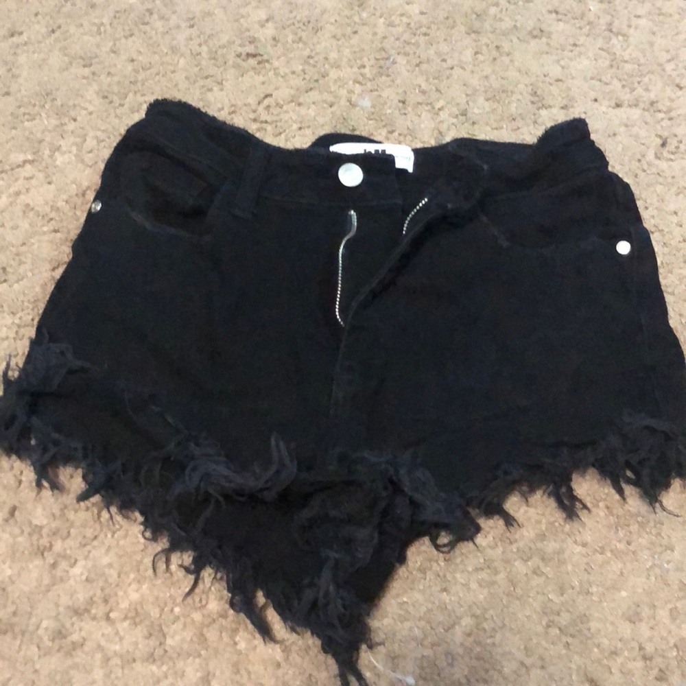 Black high rise mini short